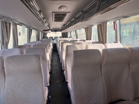 Używany żółty autobus King Long z silnikiem Yuchai o pojemności 63 miejsc i manualną skrzynią biegów