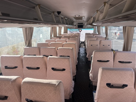 Używany żółty autobus King Long z silnikiem Yuchai o pojemności 63 miejsc i manualną skrzynią biegów